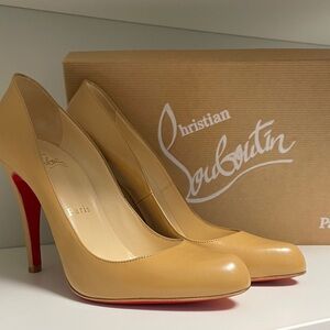 Brand new! Christian Louboutin Beige Heels with Signature Red Soles